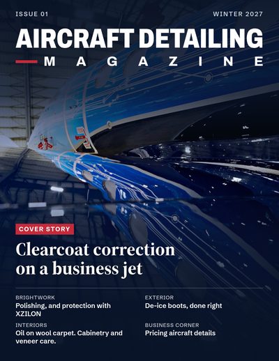 Issue 01, Winter 2027 cover: the nose of a blue business jet reflected in a glossy hangar floor, under the Aircraft Detailing Magazine masthead. Cover story: Clearcoat correction on a business jet.